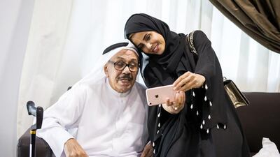 Hamza Al Hashim with daughter Yasmeen. His return home is a tribute to his rehabilitation work. Reem Mohammed / The National