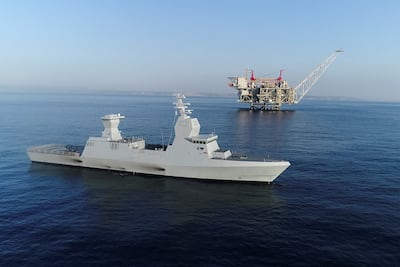 An Israeli military ship sails next to the production platform in the Leviathan gasfield. Reuters