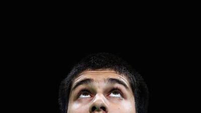 US table tennis player Kanak Jha looks at the ball during a practice session at Rio Centro. Dean Mouhtaropoulos / Getty Images