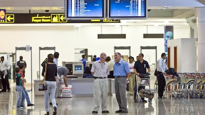 Ellie Hollman was accused of taking pictures of immigration officials at Dubai International Airport. Amy Leang / The National