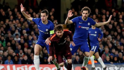 Cesar Azpilicueta, left, and Cesc Fabregas, right, are not yet assured of places in Spain's squad for this summer's World Cup in Russia. David Klein / Reuters