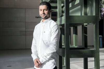 Artist Nasser Salem at Abu Dhabi Art. (Photo: Antonie Robertson/The National)