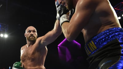 Tyson Fury overcame horrendous cuts to his right eye to take a unanimous decision over Otto Wallin in a bruising heavyweight encounter in Las Vegas. AFP