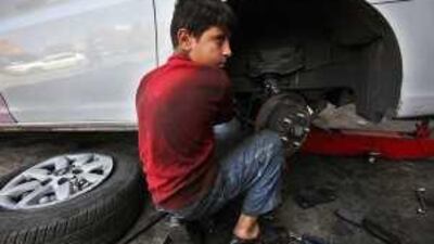 Eyad Shaaban, 14, is one of many teenage workers whose employers are breaking the law in Jordan.