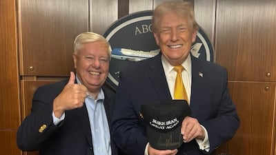 US President Donald Trump with a cap bearing the phrase 'Make Iran Great Again', alongside senator Lindsey Graham. Photo: @LindseyGrahamSC