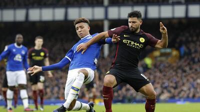 Everton's Mason Holgate, left. Darren Staples / Reuters