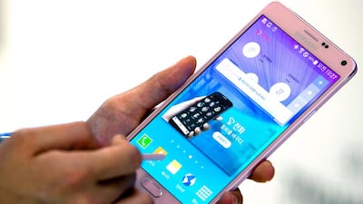 The Samsung Galaxy Note 4 has plenty of improvements from the Note 3, including an easier to use stylus pen. SeongJoon Cho / Bloomberg