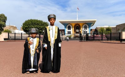 Omani boys pose for a picture while dressed in traditional costume outside Al-Alam ceremonial palace in the capital Muscat on November 17, 2018, on the eve of the Sultanate’s 48th National Day. AFP