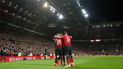 Manchester United's Paul Pogba celebrates with teammates after scoring. Reuters