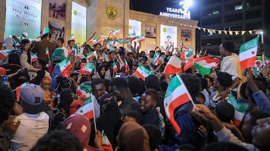 Residents wave Somaliland flags in the city of Hargeisa, as they celebrate recognition by Israel. AFP