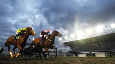 Pianissimo, right, ridden by William Carson wins the Get Switched On With Matchbook Handicap at Kempton Park on Tuesday, November 19. Getty