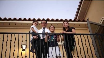 Osamah Tomeh with his wife Dima Edilbi and their children Sarah, 9 and Senned 4, at their three-bedroom Saadiyat Beach Villa home.