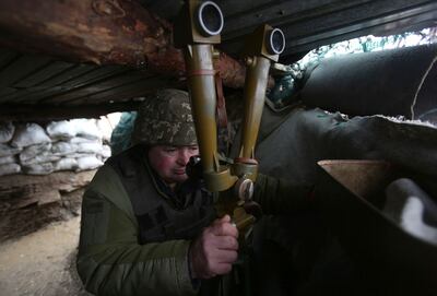 A Ukrainian soldier in on the frontlines against Russia-backed separatists near Lugansk village, in Ukraine's Donetsk region. AFP