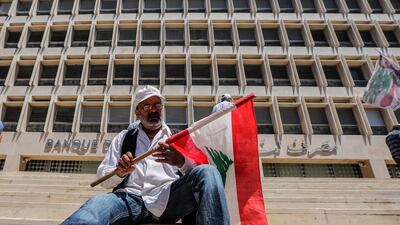 A retired army officer in front of the Lebanese Central Bank during a protest in Beirut, Lebanon, 13 May 2019. EPA