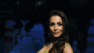 Actress Malaika Arora exudes elegance in an Anushree Reddy lehenga. AFP