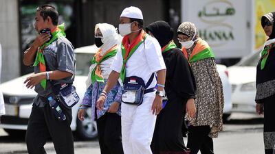 Asian pilgrims take precautions against disease in Mecca, Saudi Arabia, during last year’s Haj by wearing face masks. AFP
