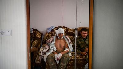 A wounded soldier getting treatment at the basement of a medical centre outside the city of Stepanakert on October 14, 2020, during the ongoing fighting between Armenia and Azerbaijan over the disputed Nagorno-Karabakh region. AFP