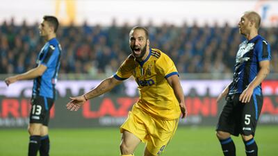 Gonzalo Higuain, centre, has plenty at stake as a Juventus player this season. Massimo Pinca / Reuters