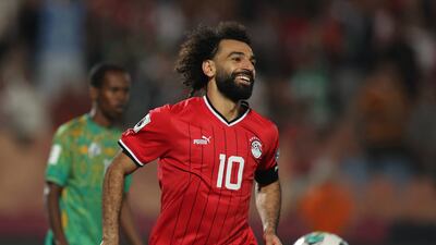 Mohamed Salah celebrates completing his hat-trick. Reuters