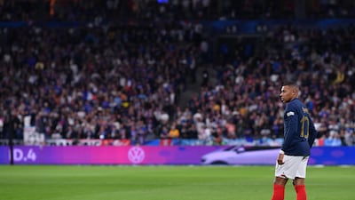 Kylian Mbappe of France prepares to take a free kick. Getty Images