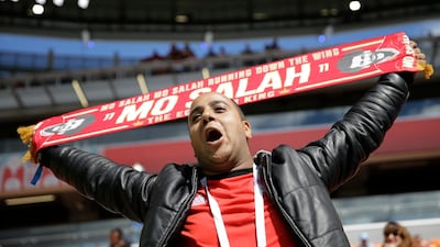 A fan gets ready to cheer on his side before the Egypt vs Uruguay match at Ekaterinburg Arena, Yekaterinburg, Russia on June 15, 2018. Natacha Pisarenko / AP Photo