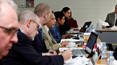 Warren Fox, right, chairs yesterday's meeting of the University Quality Assurance International Board in Dubai.