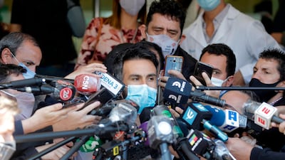 Leopoldo Luque, the personal physician of Argentina football great Diego Maradona, is interviewed by the media outside the clinic after the 60-year-old underwent brain surgery for a blood clot, in Buenos Aires province, on Wednesday, November 4, AFP