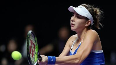 Belinda Bencic plays a backhand against Kiki Bertens during their WTA Finals clash in Shenzhen. Getty Images