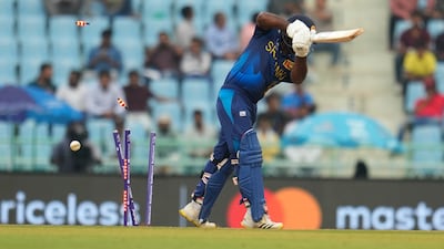 Sri Lanka's Kusal Perera bowled by Australia's captain Pat Cummins. AP