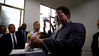 Democratic Republic of Congo's President Joseph Kabila casts his vote at a polling station in Kinshasa. Reuters