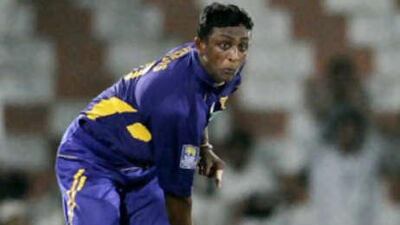 The Sri Lankan spinner Ajantha Mendis bowls against Pakistan during their Super Four round match in Karachi.