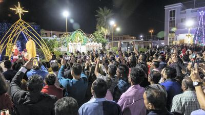 Thousands of Christians attend midnight mass at St Mary’s in Dubai, the largest church in the Gulf. All photos by Antonie Robertson / The National