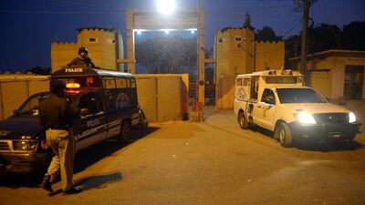 In this photograph taken on January 13, 2015, Pakistani policemen keep vigil outside the central jail in Karachi where authorities are said to have executed a prisoner. Rizwan Tabassum/AFP Photo