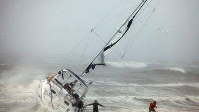 A boat founders in the waters of the Chesapeake Bay.