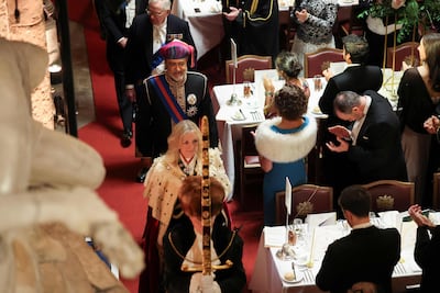 Lady Mayor Susan Langley and Oman's Sultan Haitham head for their seats during a state banquet at the Guildhall in the City of London. AFP