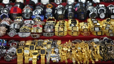 Watches displayed at Dubai Souq, in Deira area of the emirate. Dubai and Abu Dhabi are giving relief in administrative fines to the businesses whose licenses have expired. Amy Leang / The National