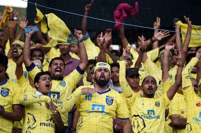 Kerala Blasters FC supporters cheering their side on against Atletico de Kolkata in Kochi on December 18, 2016. Sajjad Hussain / AFP