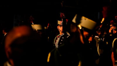 Royal Guard members gather prior the military parade before the military parade on the national holiday known as "Dia de la Hispanidad" or Hispanic Day in Madrid, Spain, Thursday, Oct. 12, 2023. Spain commemorates Christopher Columbus' arrival in the New World and also Spain's Armed Forces Day. (AP Photo / Manu Fernandez)