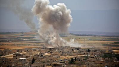 Khan Sheikhoun under bombardment in June this year. AFP