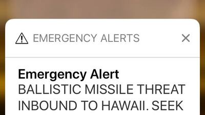 This smartphone screen capture shows a false incoming ballistic missile emergency alert sent from the Hawaii Emergency Management Agency system. Caleb Jones / AP Photo