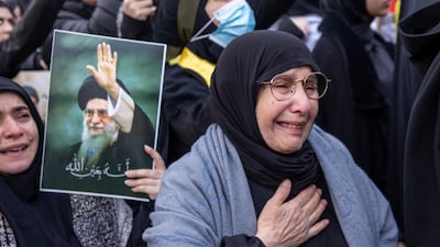 A woman cries while attending an event honouring Iran's former supreme leader Ayatollah Ali Khamenei in southern Beirut, Lebanon. Getty Images