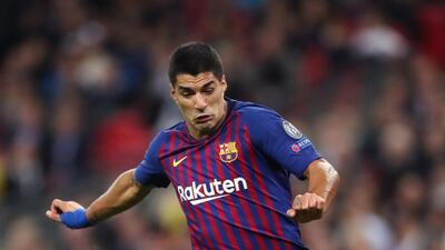 Former Liverpool striker Luis Suarez is set to move to Atletico Madrid after they agreed a fee with Barcelona. PA