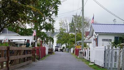 Main Ridge Road, one of three main arteries on Tangier Island. The island consists of three ridges connected by bridges.