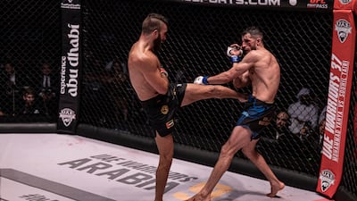 Mohammad Yahya lands a high kick.