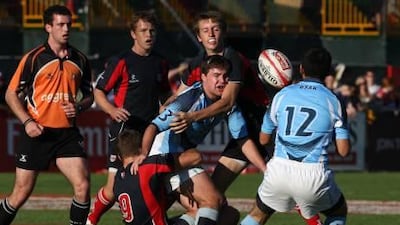 Dubai College, in dark blue, and BSAK battle it out in the Gulf Under 18 final at The Sevens.