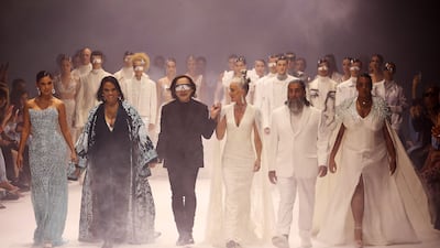 Michael Cinco takes to the catwalk at the end of his autumn/winter 2022 show.