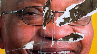 A torn African National Congress (ANC) election poster shows the face of South African president Jacob Zuma, who is under pressure from his party to step down after being replaced as ANC chief in December 2017. Kim Ludbrook / EPA