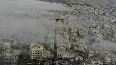 An aerial view shows the rebel-held town of Ariha in the northern countryside of Syria's Idlib province following an air strike by pro-regime forces. AFP