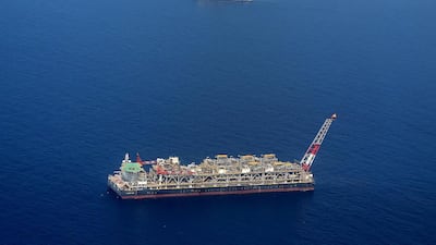 A gas flare burns on the Agbami floating oil production, storage and offloading vessel. George Osodi / Bloomberg