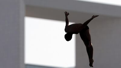 Abu Dhabi, United Arab Emirates - November 10, 2018: Miguel Garcia of Colombia competes in the final of the mens section at the Fina High Board Diving World Cup. Saturday, Novemeber 10th, 2018 at the Abu Dhabi Yacht and Sailing Club, Abu Dhabi. Chris Whiteoak / The National